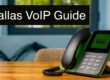 Desk phone on a wooden table with a large black banner reading 'Dallas VoIP Guide'.