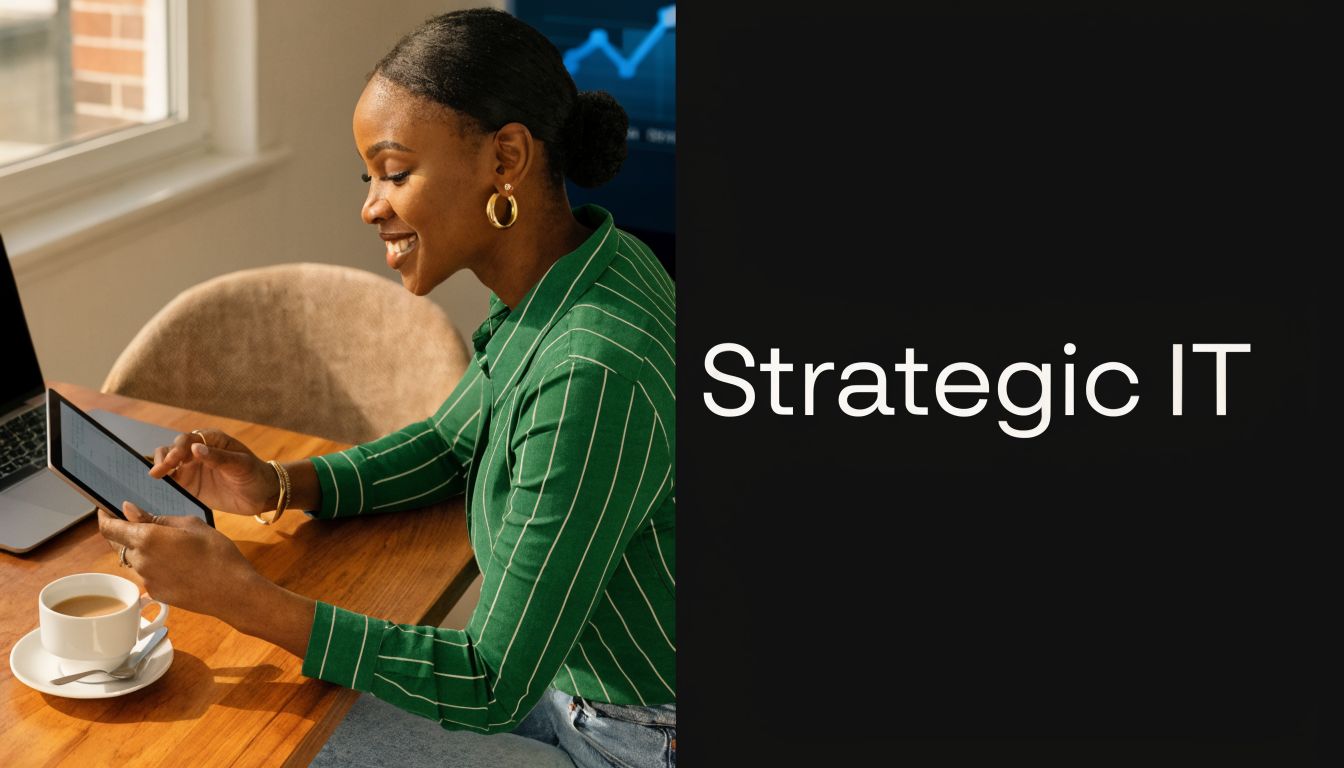A professional woman in a green striped shirt smiles while reviewing information on a tablet in an office.