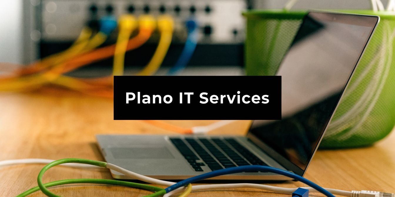 Black banner reading 'Plano IT Services' over a laptop and colorful Ethernet cables in a tech workspace