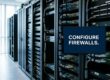 Data center with rows of server racks; a blue screen displays the message 'CONFIGURE FIREWALLS'.