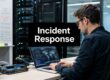 IT professional in a server room typing on a laptop with 'Incident Response' displayed prominently in the foreground.