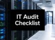 IT Audit Checklist sign displayed over row of server racks in a data center