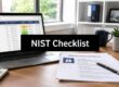 Laptop open to a 'Controls Mapping' spreadsheet with a bold 'NIST Checklist' banner across the screen; a security guidelines document and pen on the desk with a plant nearby.
